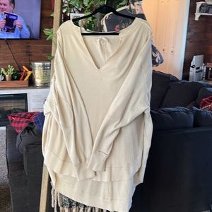 Free people cream colored tunic.